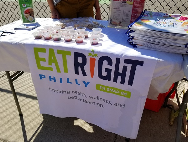 The Eat.Right.Philly table at a farm stand event outside Belmont Charter School